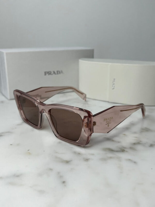 Prada PR08YS Cat Eye Sunglasses in Transparent Peach - Image 3